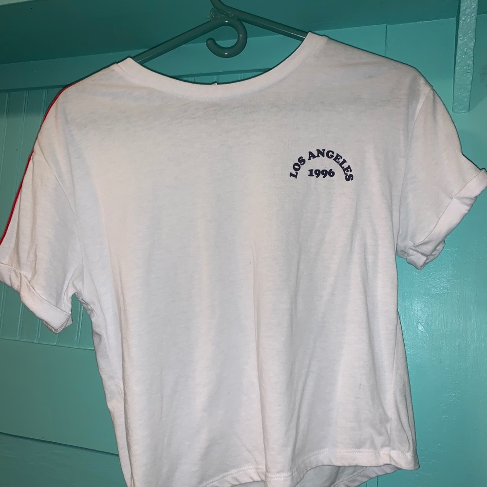 White top says Los Angeles with red,blue detailing